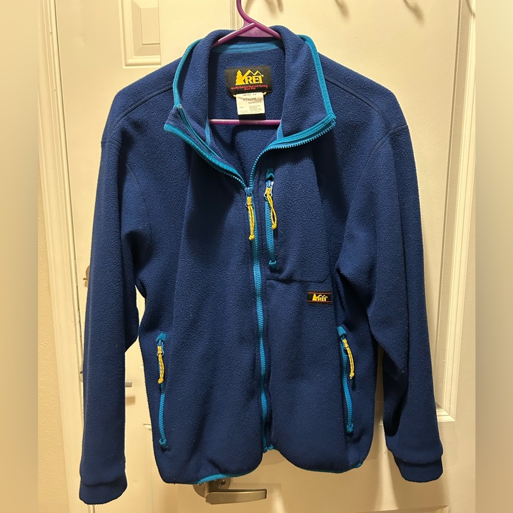 REI woman’s blue jacket